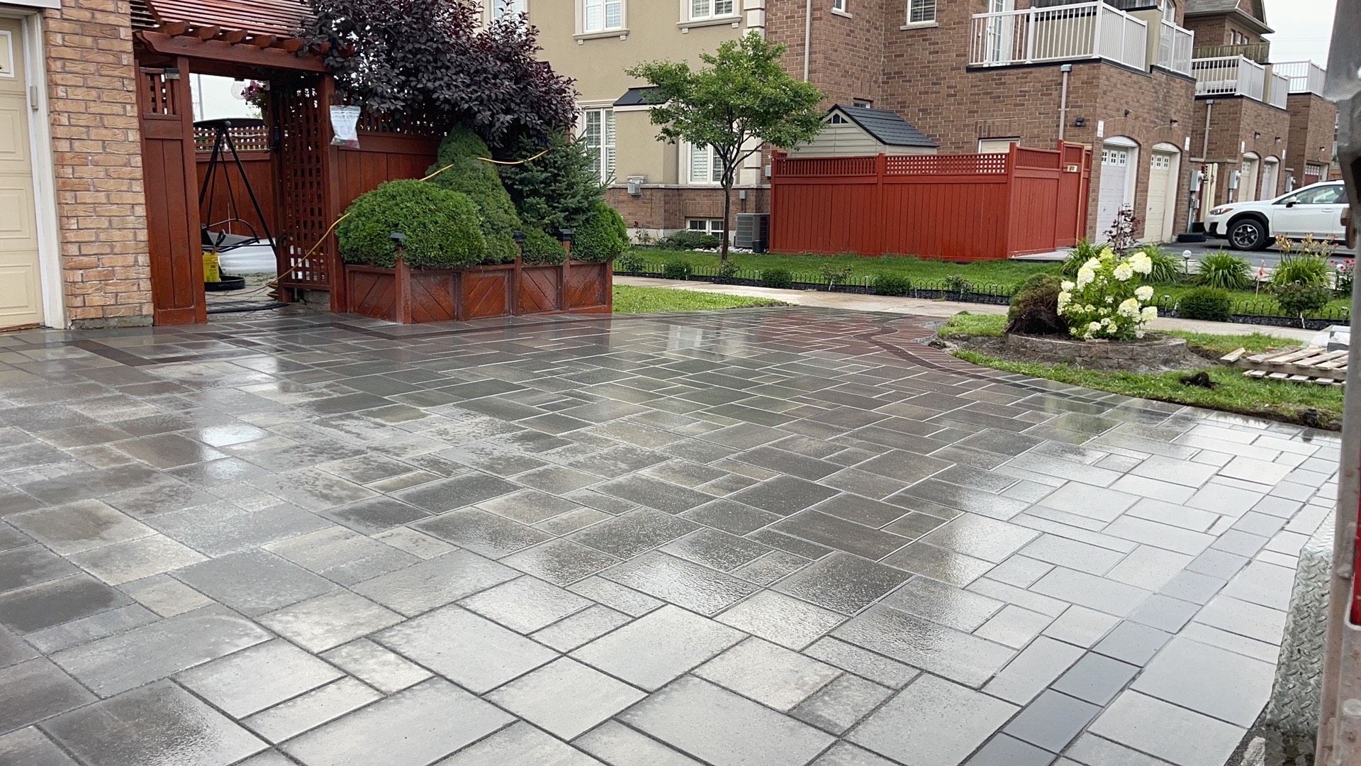 Large low-maintenance interlocking patio designed for outdoor entertaining in the GTA